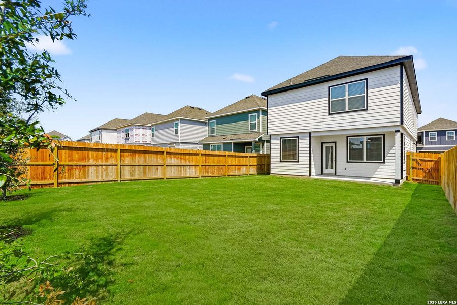 Exterior details and patio area of a home in Melissa Ranch, San Antonio (Image 17).