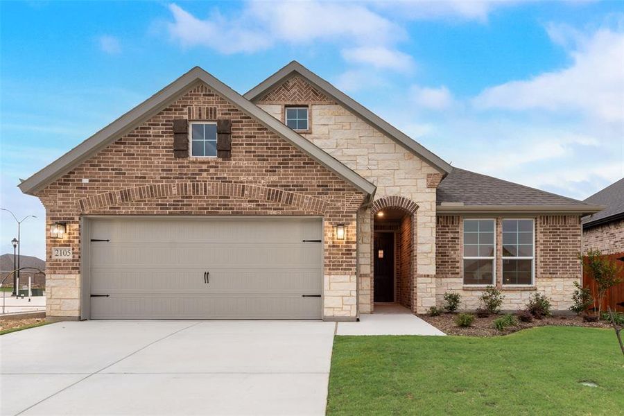 Front exterior of a new home in Northstar, Haslet, TX, highlighting curb appeal (Image 15).