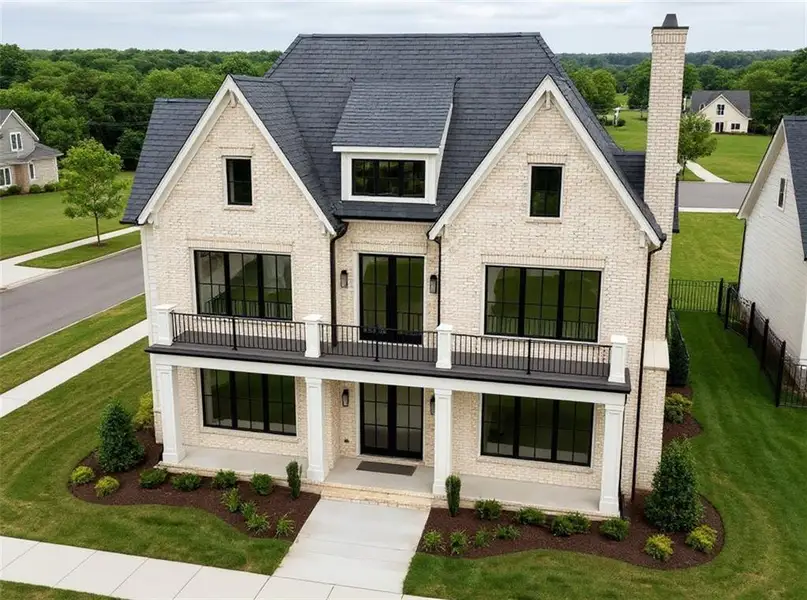 Front exterior of a new home in , Buford, GA, highlighting curb appeal (Image 5). Front exterior of a new home in , Buford, GA, highlighting curb appeal (Image 5).
