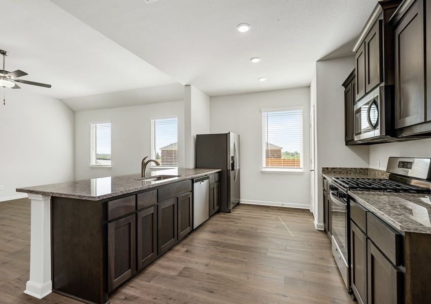The kitchen has beautiful wood cabinetry. The kitchen has beautiful wood cabinetry.