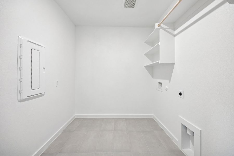 Utility Room in the Heisman home plan by Trophy Signature Homes – REPRESENTATIVE PHOTO
