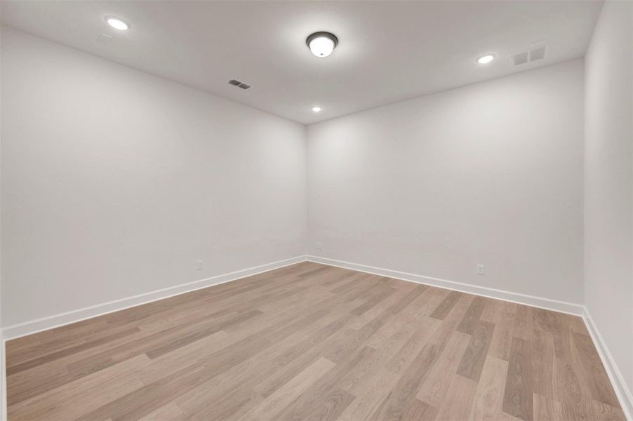 Spacious, unfurnished interior of a new home in Harvest Green - Parkview Collection, Richmond (Image 18). Spacious, unfurnished interior of a new home in Harvest Green - Parkview Collection, Richmond (Image 18).