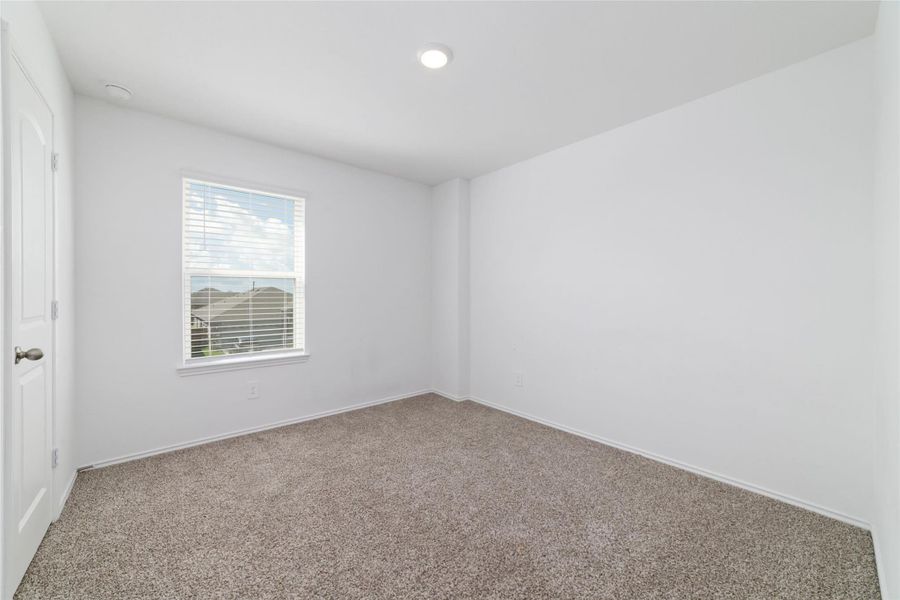 Spacious, unfurnished interior of a new home in Sunterra, Katy (Image 29).