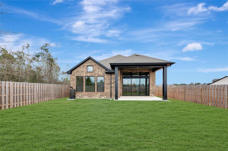Exterior details and patio area of a home in COLTON - Reserve Collection, Todd Mission (Image 30).