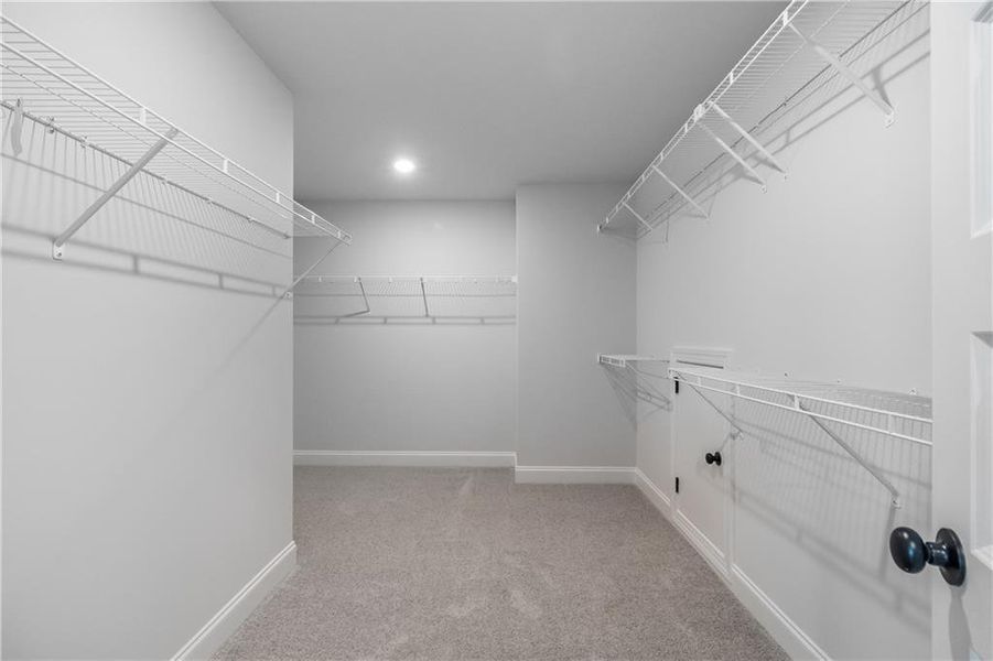 Spacious, unfurnished interior of a new home in Calgary Downs, Winder (Image 9).