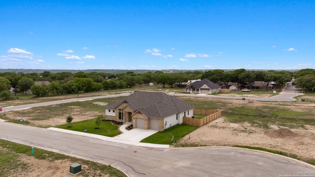 Front exterior of a new home in , Castroville, TX, highlighting curb appeal (Image 27). Front exterior of a new home in , Castroville, TX, highlighting curb appeal (Image 27).