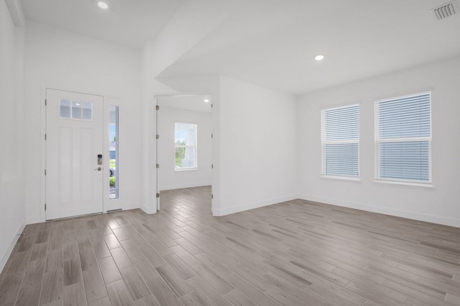 Spacious, unfurnished interior of a new home in The Cove at West Port, Port Charlotte (Image 12).