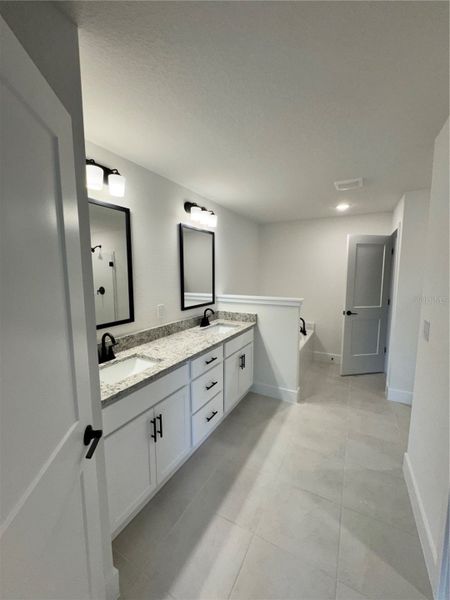 Furnished interior view inside a new home in Watercress Cove, North Port (Image 6).