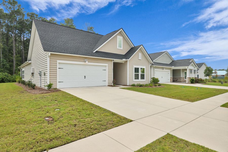 Front exterior of a new home in , Summerville, SC, highlighting curb appeal (Image 19).