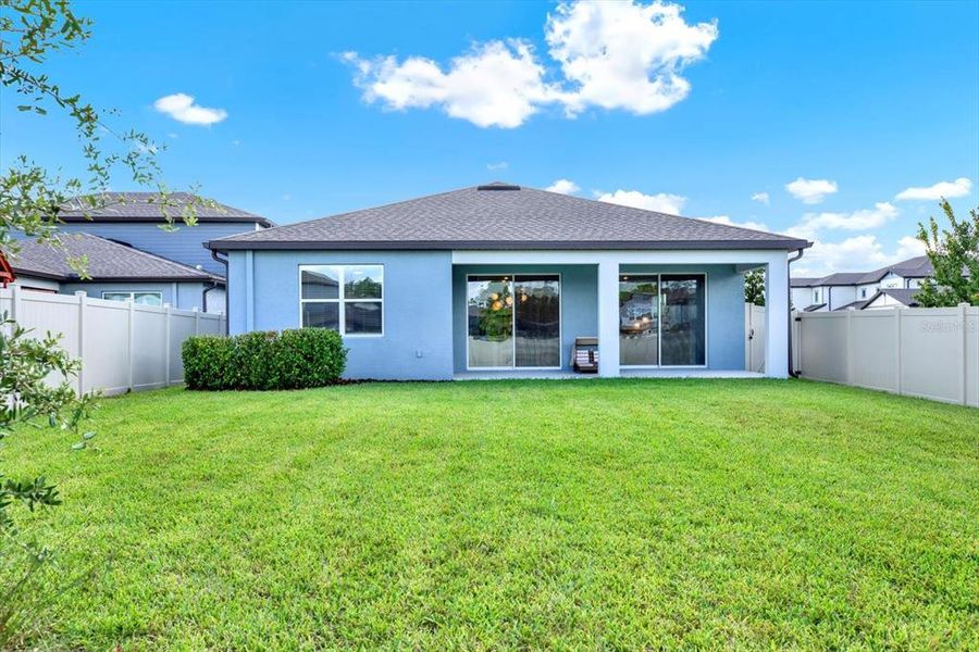 Front exterior of a new home in , Land O' Lakes, FL, highlighting curb appeal (Image 19).