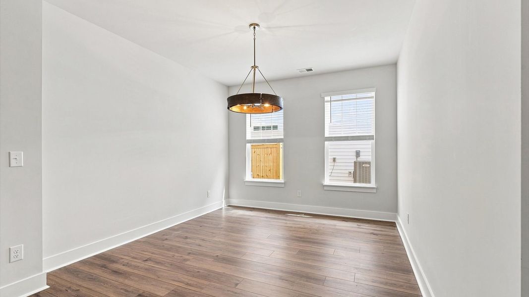 Desirable formal dining room with accomplished details in a reputable DRB Homes community Desirable formal dining room with accomplished details in a reputable DRB Homes community
