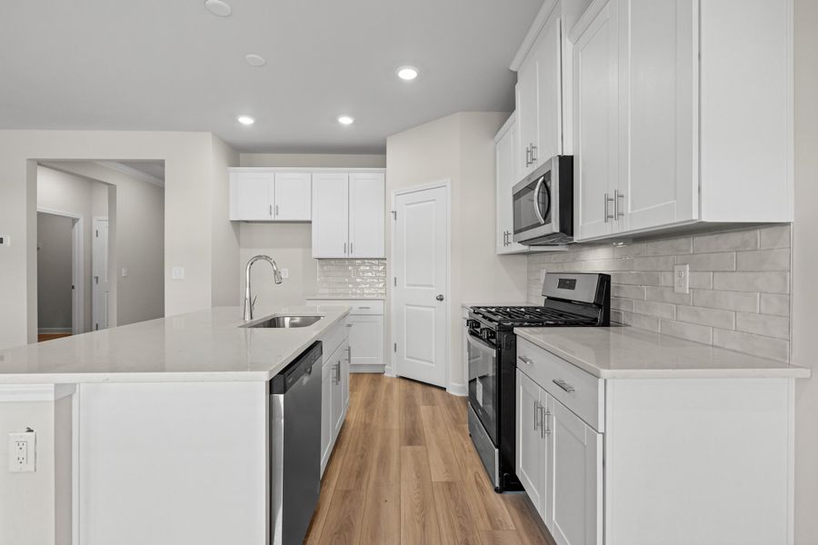 Furnished interior view inside a new home in Cypress Ridge - The Boardwalk Series, Longs (Image 5).