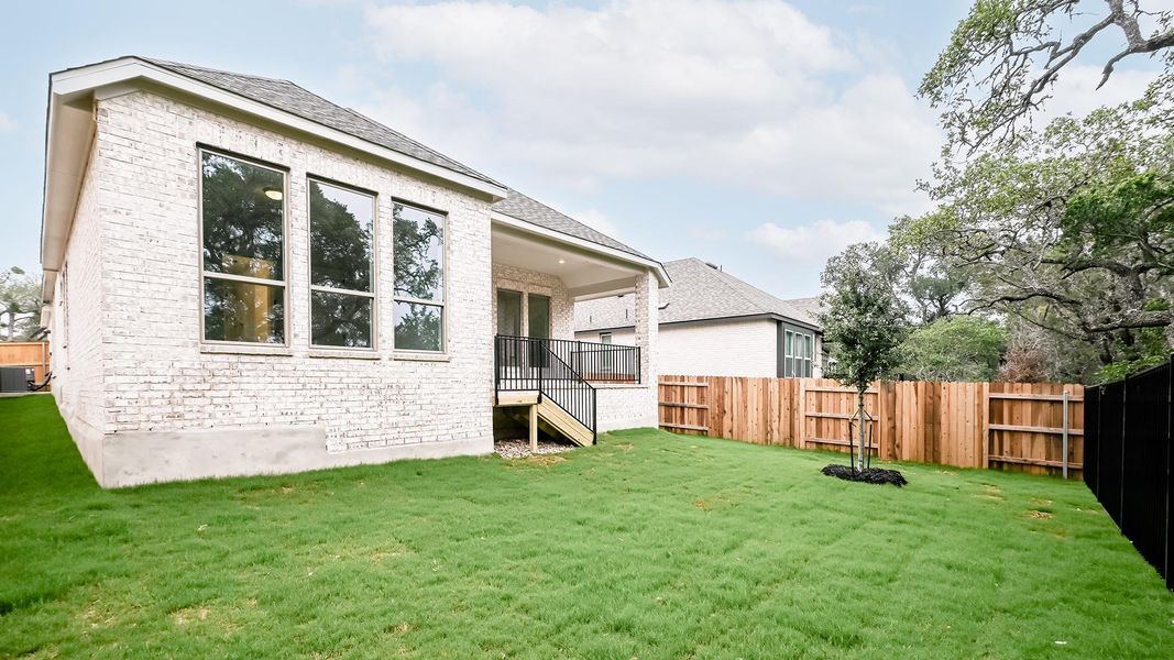 Exterior details and patio area of a home in 6 Creeks, Kyle (Image 4).