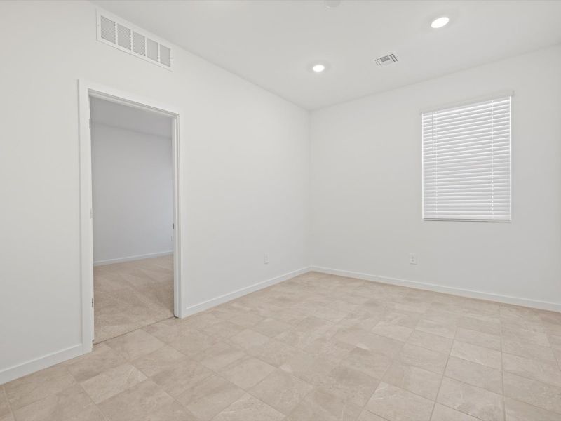 Spacious, unfurnished interior of a new home in Rancho Mirage Estate Series, Maricopa (Image 10).