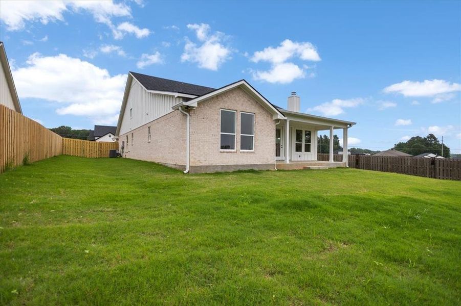 Exterior details and patio area of a home in , Lindale (Image 23).