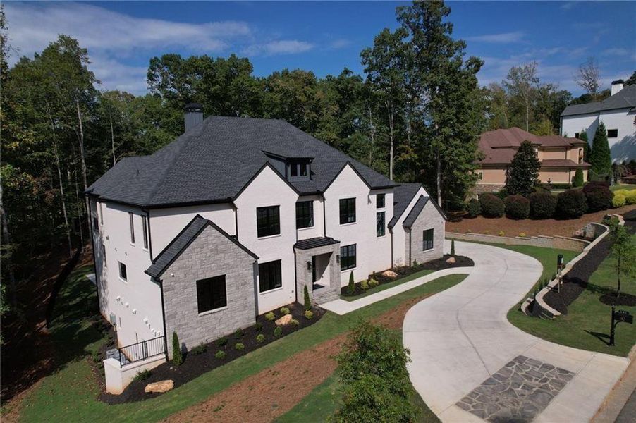 Front exterior of a new home in , Alpharetta, GA, highlighting curb appeal (Image 37).