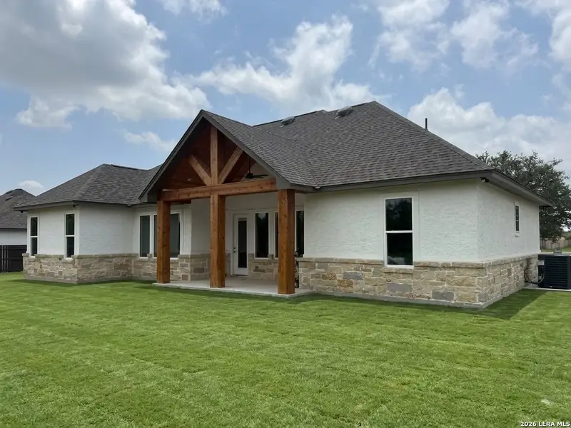 Exterior details and patio area of a home in , Lytle (Image 4).