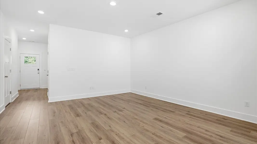 First-rate family room with thoughtful layout and superior connection to kitchen and dining spaces at Marion Square