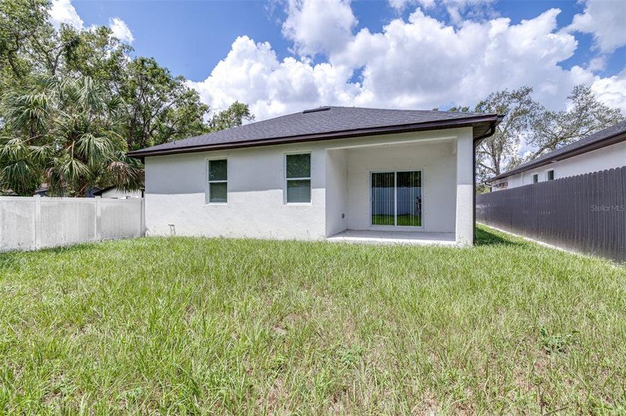 Front exterior of a new home in , Tampa, FL, highlighting curb appeal (Image 1).