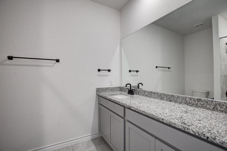 Representative furnished interior of a home built from the The Lanier F by Davidson Homes LLC in The Reserve at Potranco Oaks, Castroville (Image 11).