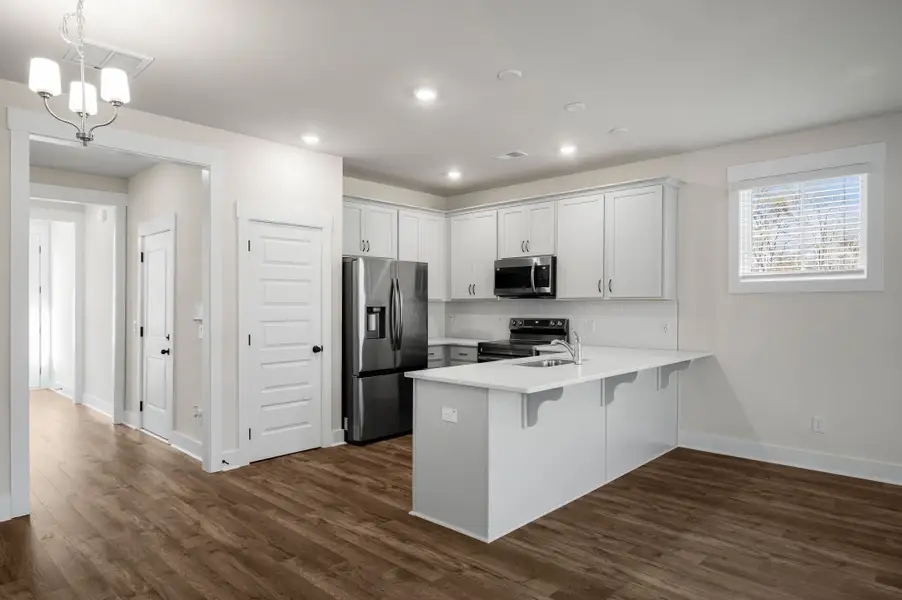 Furnished interior view inside a new home in Windward Townes, Goose Creek (Image 5).
