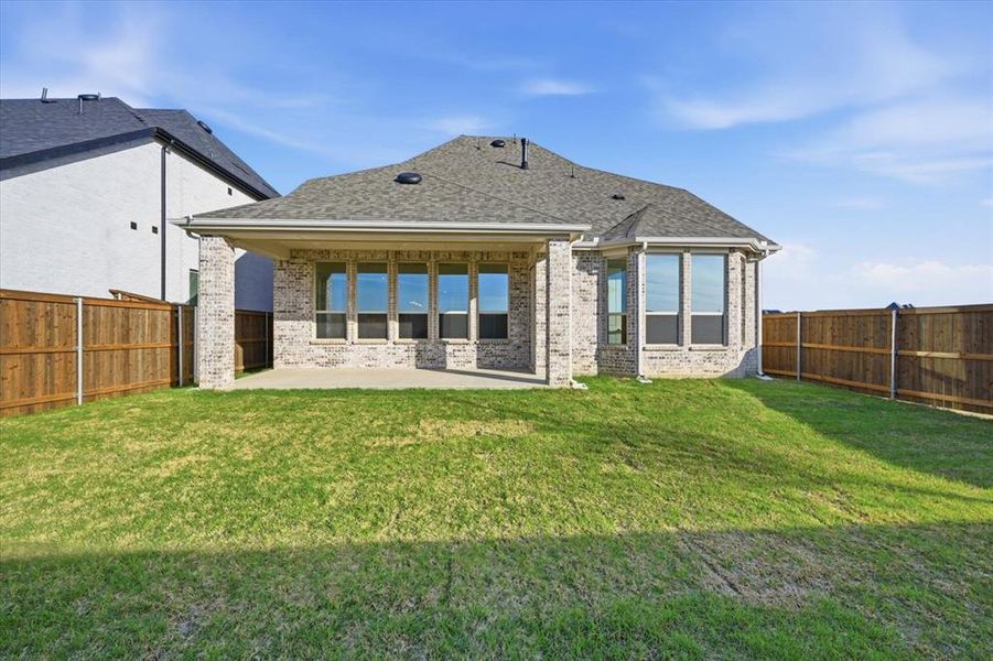 Exterior details and patio area of a home in Cambridge Crossing, Celina (Image 3).