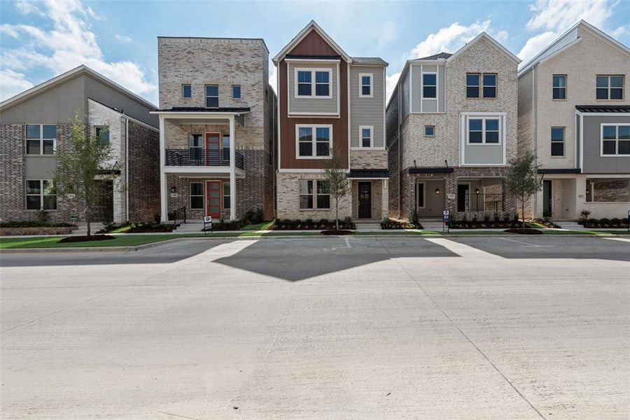 Front exterior of a new home in City Point, North Richland Hills, TX, highlighting curb appeal (Image 21). Front exterior of a new home in City Point, North Richland Hills, TX, highlighting curb appeal (Image 21).