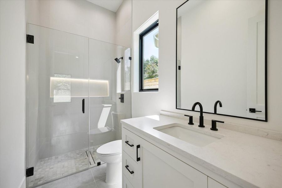 Fullsize bathroom downstairs. Fullsize bathroom downstairs.