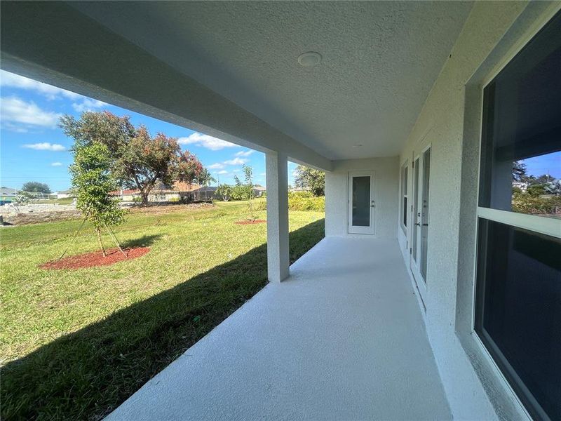 Exterior details and patio area of a home in Deep Creek, Punta Gorda (Image 3).
