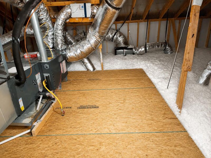 Expansive attic decking provides abundant storage for seasonal items and household essentials, with LP TechShield radiant barrier and insulation supporting the home's energy-efficient design.