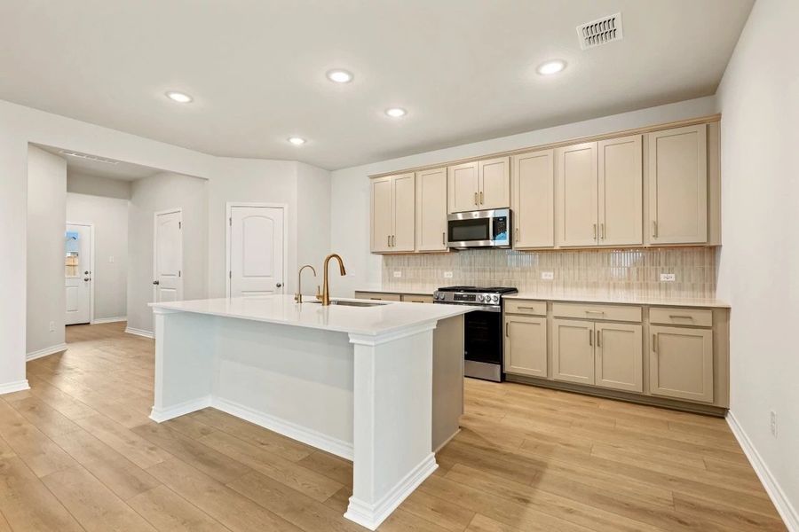Furnished interior view inside a new home in The Cottages at Lariat, Liberty Hill (Image 6).