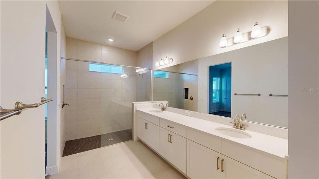 Furnished interior view inside a new home in Laureate Park, Orlando (Image 6).