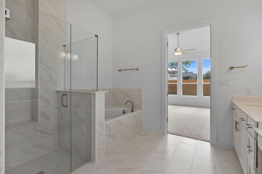 Primary Bath retreat with garden tub & walk-in shower Primary Bath retreat with garden tub & walk-in shower