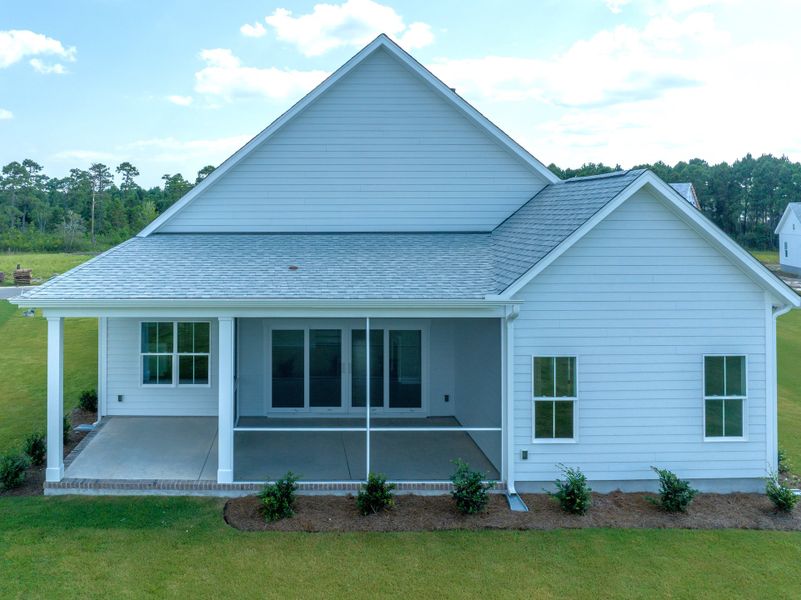 Representative exterior photo of a completed home built from the Kauai by Bill Clark Homes in Osprey Landing, Southport, NC (Image 30). Representative exterior photo of a completed home built from the Kauai by Bill Clark Homes in Osprey Landing, Southport, NC (Image 30).