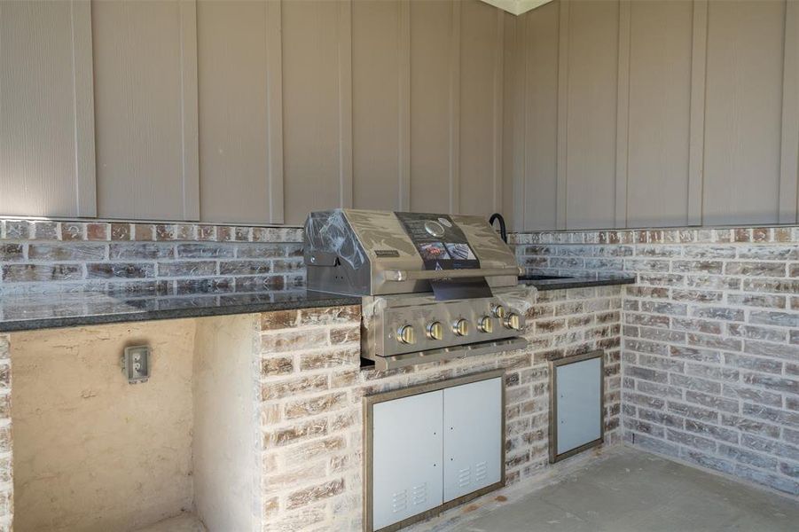 View of patio featuring area for grilling View of patio featuring area for grilling