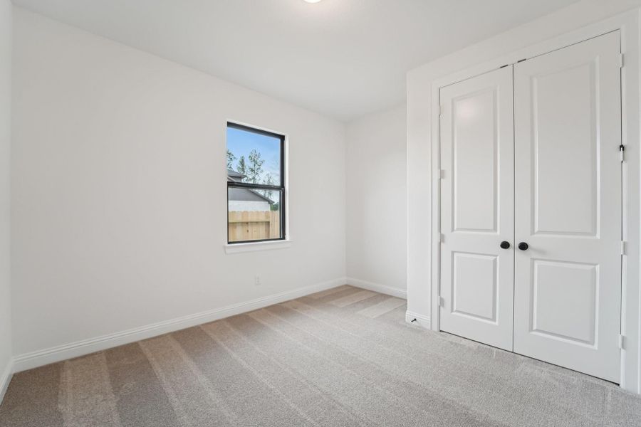 Spacious, unfurnished interior of a new home in Evergreen 55', Conroe (Image 44).