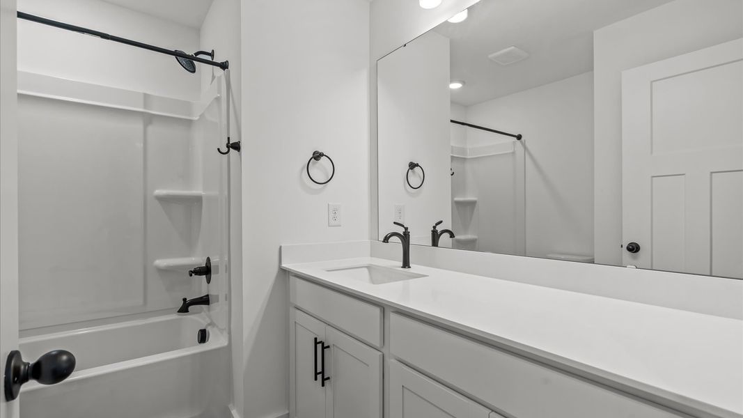 Stylish guest bathroom with superior design and thoughtful storage solutions