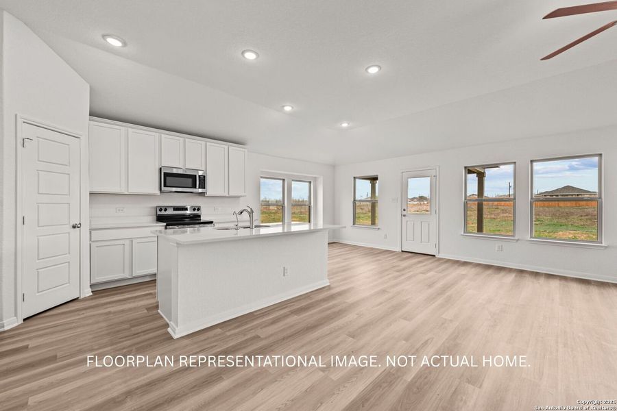 Furnished interior view inside a new home in Chaparral Ranch, Floresville (Image 4).