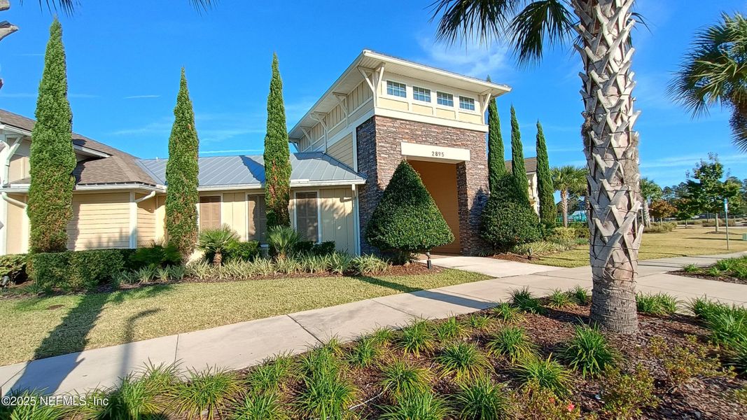 Front exterior of a new home in Cross Creek, Green Cove Springs, FL, highlighting curb appeal (Image 24).