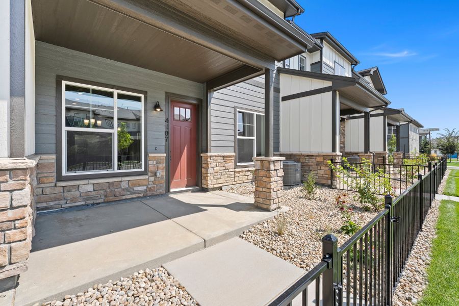 Exterior details and patio area of a home in The Lakes at Centerra, Loveland (Image 2). Exterior details and patio area of a home in The Lakes at Centerra, Loveland (Image 2).