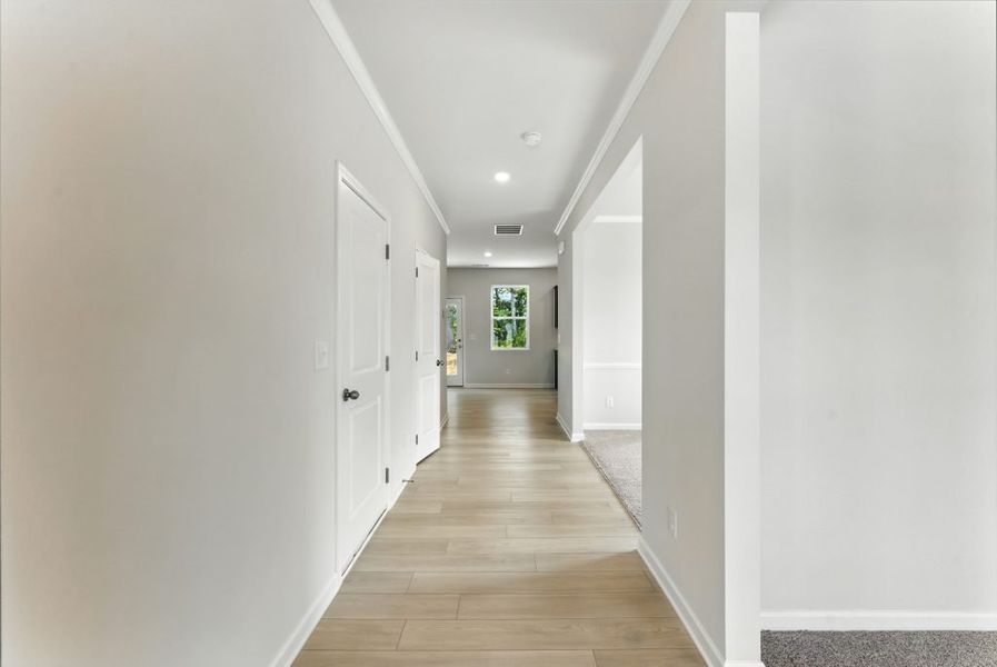 Representative unfurnished interior of a home built from the Brentwood by Piedmont Residential in Falls Creek, Flowery Branch (Image 11).