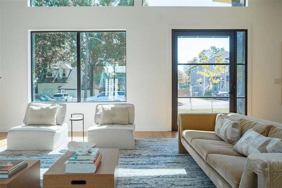 Living room with hardwood / wood-style flooring