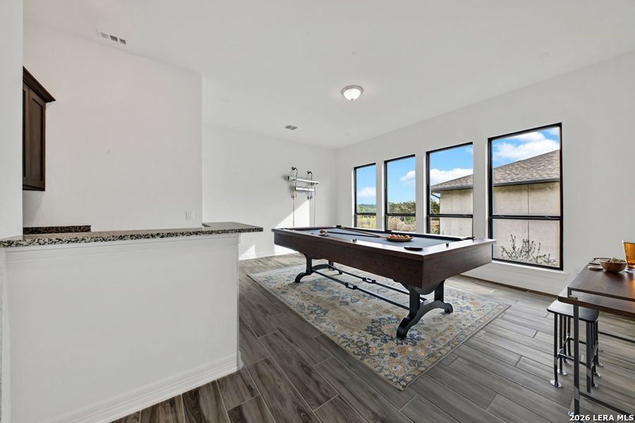 Furnished interior view inside a new home in El Sonido at Campanas, San Antonio (Image 10).