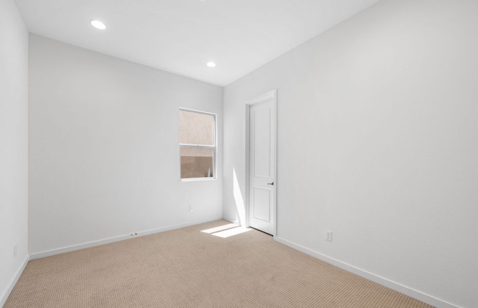 Spacious, unfurnished interior of a new home in Legado West, Queen Creek (Image 17).
