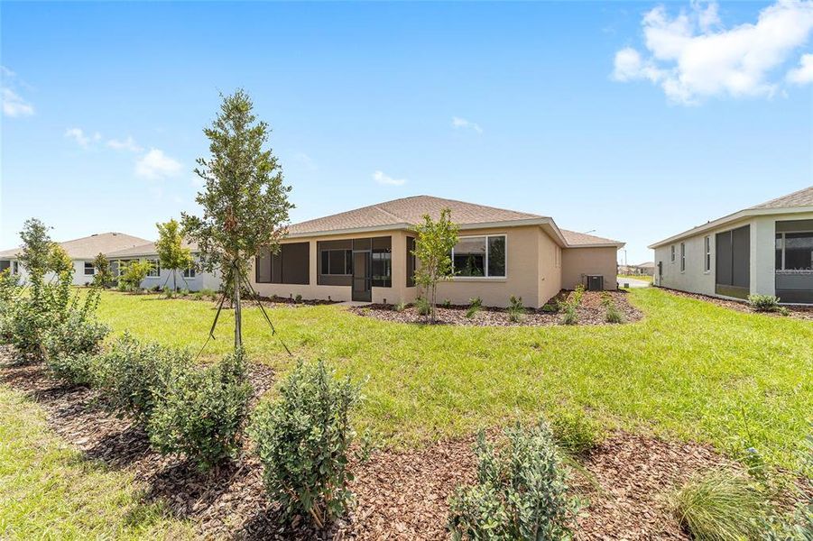 Exterior details and patio area of a home in On Top of the World Communities, Ocala (Image 3).