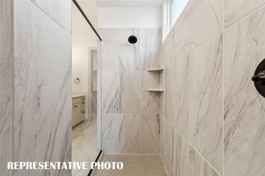 Offering a luxurious walk in shower with drying area, this owner's bath is a dream come true! REPRESENTATIVE PHOTO Offering a luxurious walk in shower with drying area, this owner's bath is a dream come true! REPRESENTATIVE PHOTO