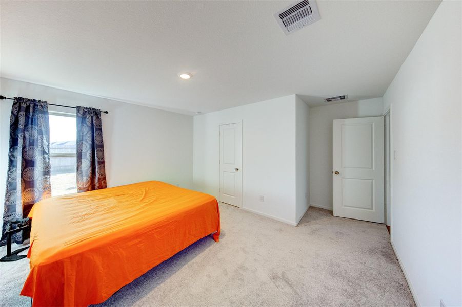 Primary bedroom, located at the back of the house