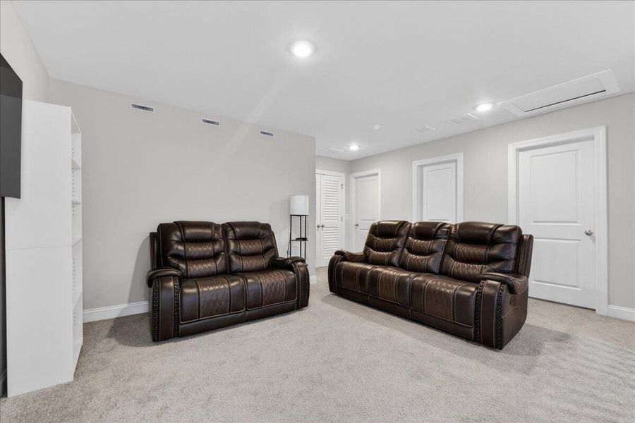 Furnished interior view inside a new home in Jasmine Point at Lakes of Cane Bay, Summerville (Image 14).