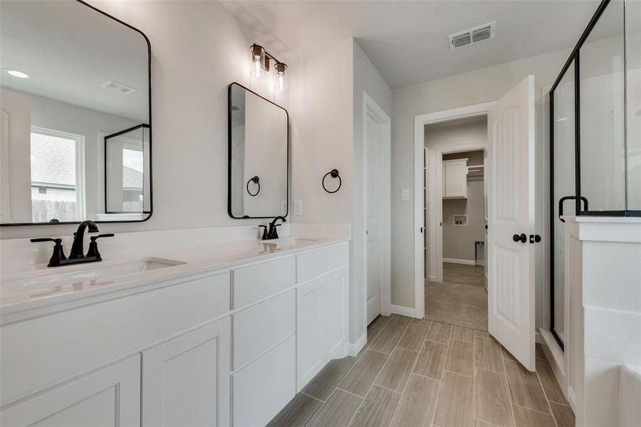 Bathroom with dual vanity