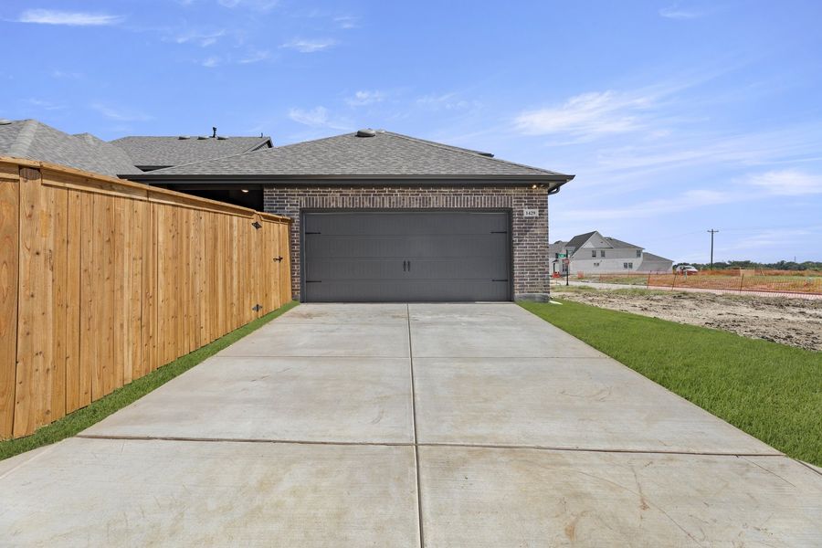 Exterior details and patio area of a home in Hillside Village 40s, Celina (Image 4).